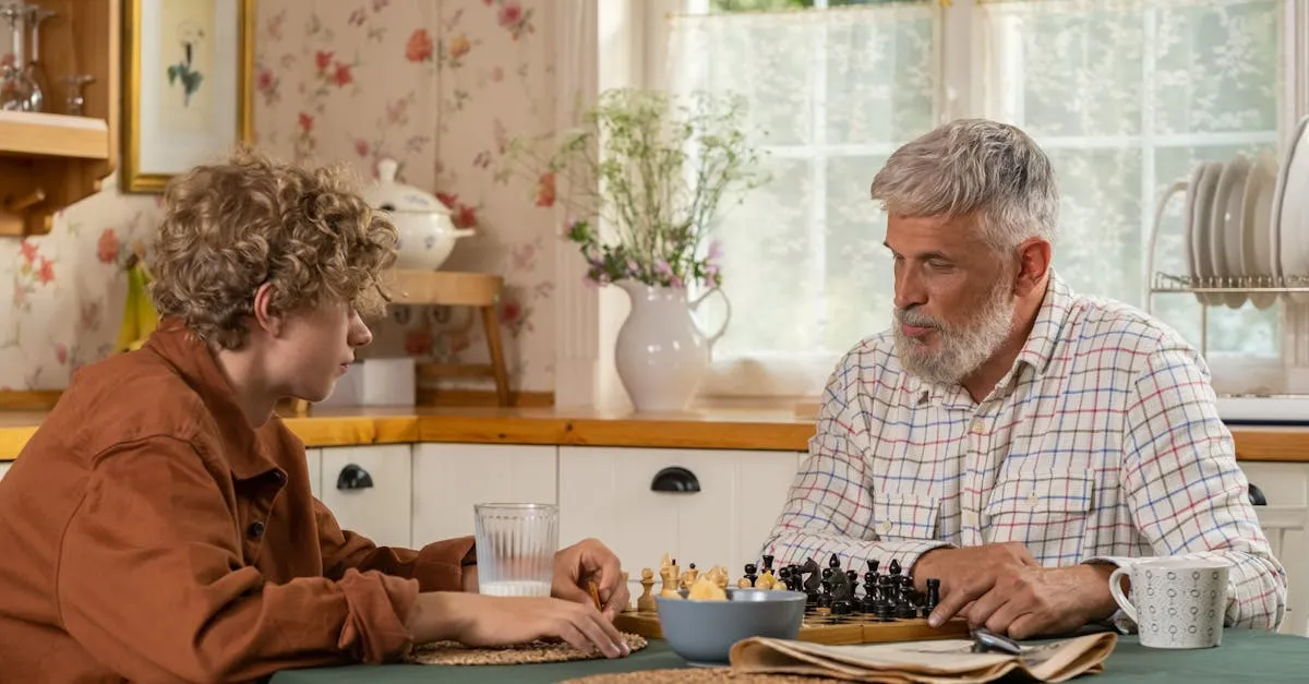 Grandfather and teenage grandson enjoying a chess game together in a cozy kitchen
